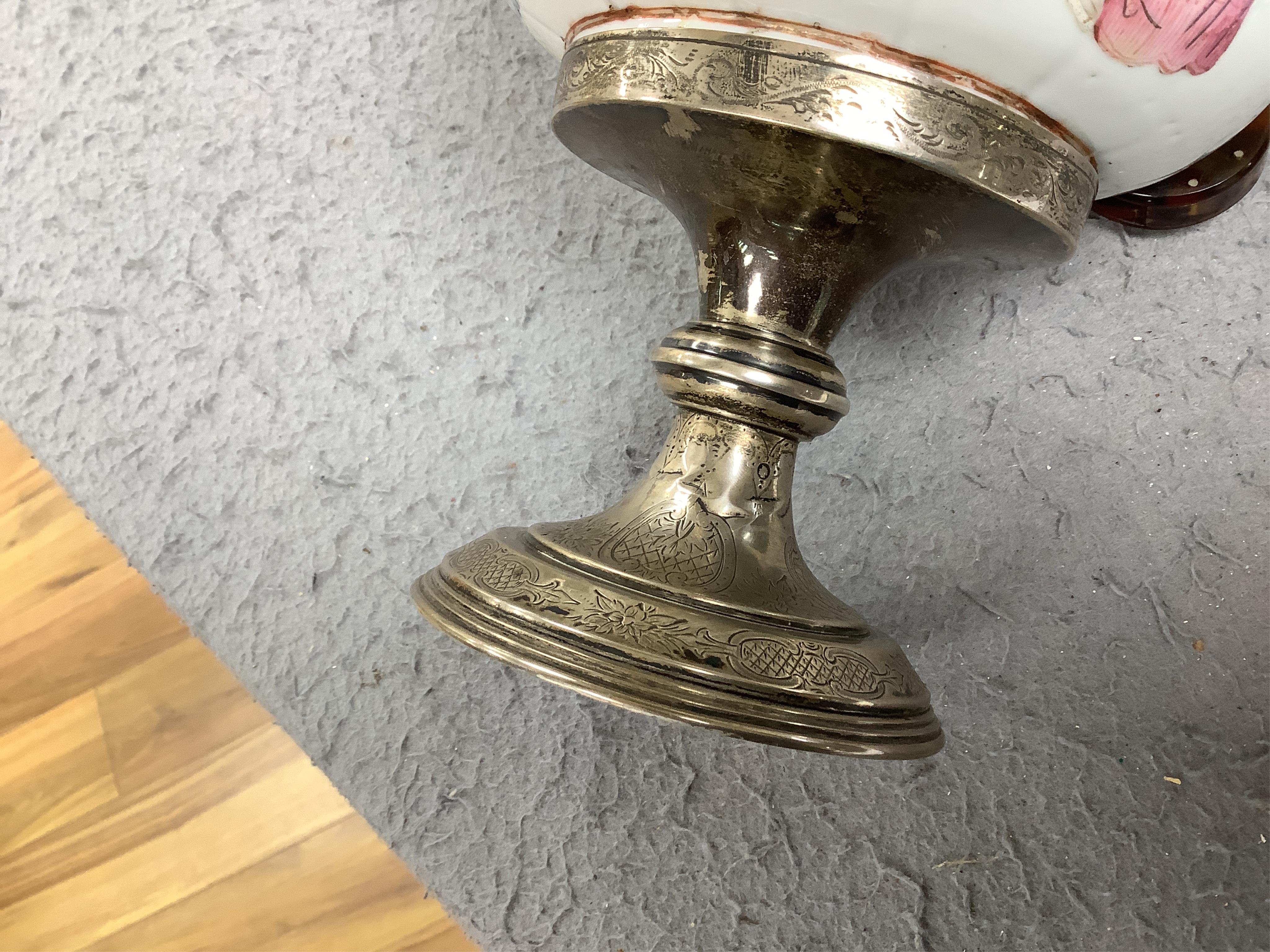 A mid 19th century Chinese famille rose bowl, with European silver mounts, 21cm. Condition - later silver mounts, hairline crack